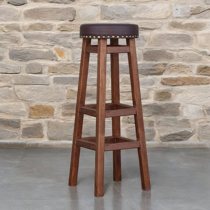 Height Wooden Green Bar Stool Made of Natural Alder Wood with a Soft Seat in the Style of an Irish Pub with metal rivets