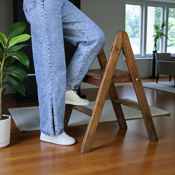 Low natural wooden ladder folding small stepladder